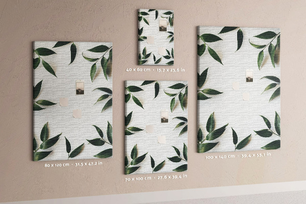Wall cork memo board Green leaves on a light background