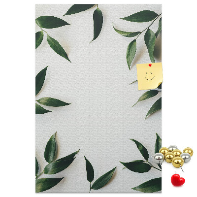Wall cork memo board Green leaves on a light background
