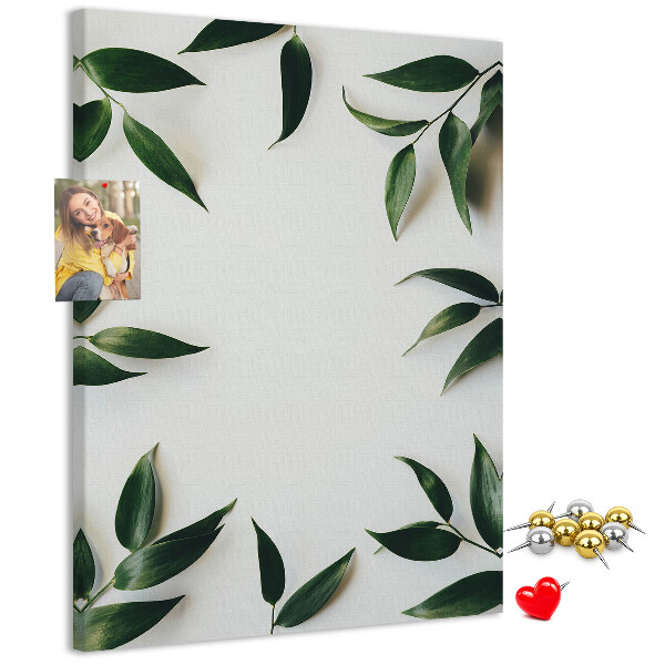 Wall cork memo board Green leaves on a light background