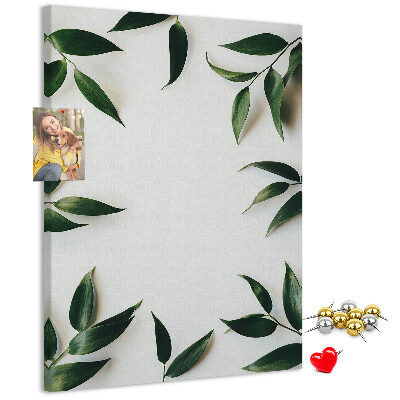 Wall cork memo board Green leaves on a light background