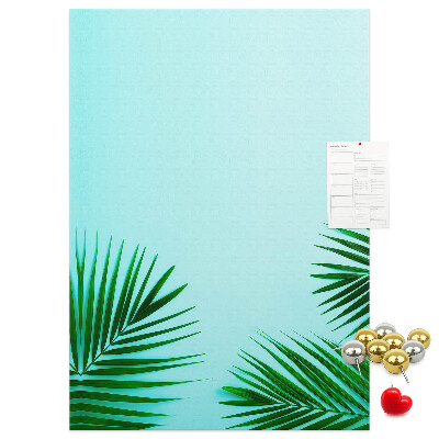 Pin board Tropical leaves on a blue background