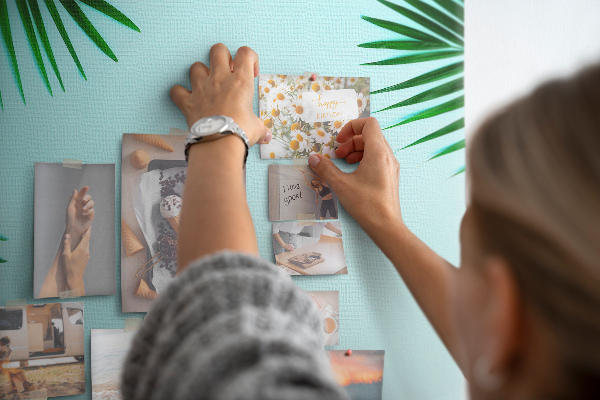Wall cork memo board Palm leaves on a blue background