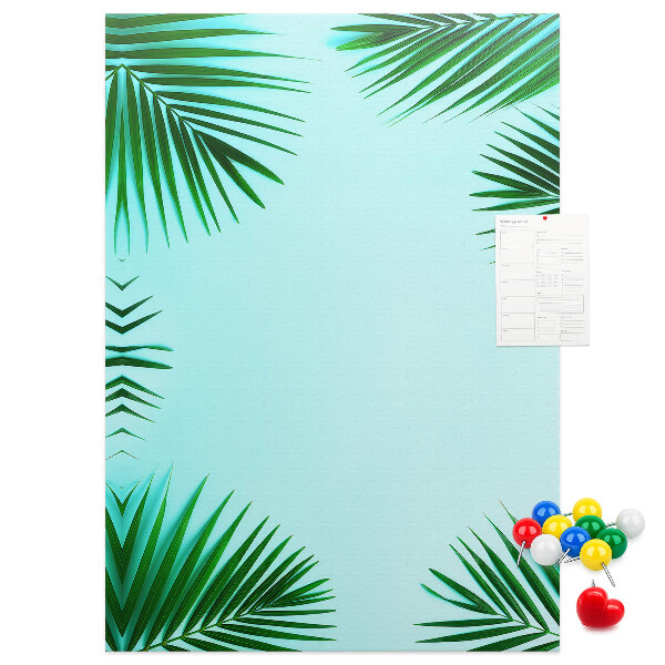 Wall cork memo board Palm leaves on a blue background