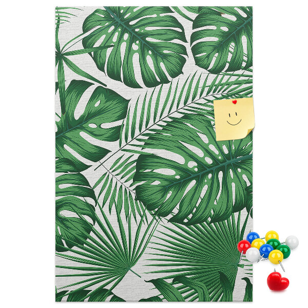 Wall cork memo board Monstera leaves on a light background