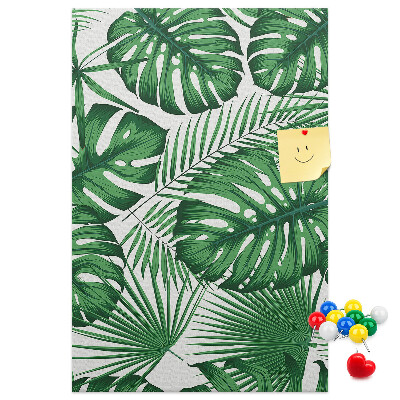 Wall cork memo board Monstera leaves on a light background