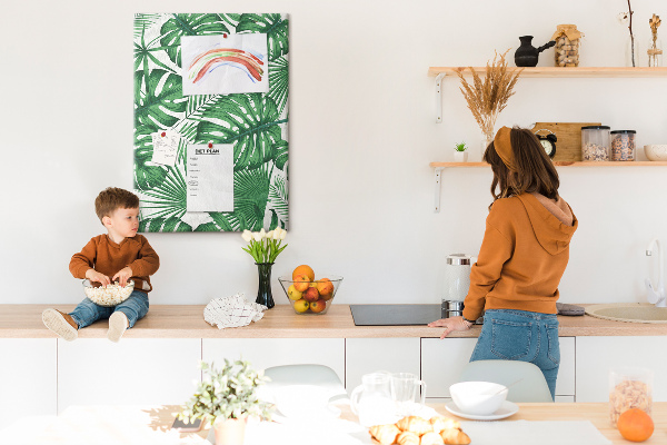 Wall cork memo board Monstera leaves on a light background