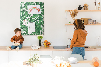 Wall cork memo board Monstera leaves on a light background