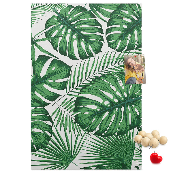 Wall cork memo board Monstera leaves on a light background