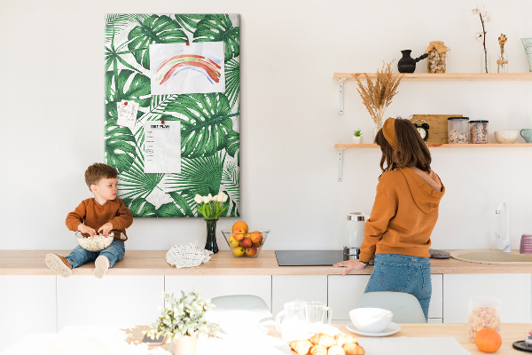 Wall cork memo board Monstera leaves on a light background