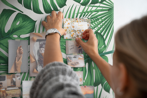 Wall cork memo board Monstera leaves on a light background