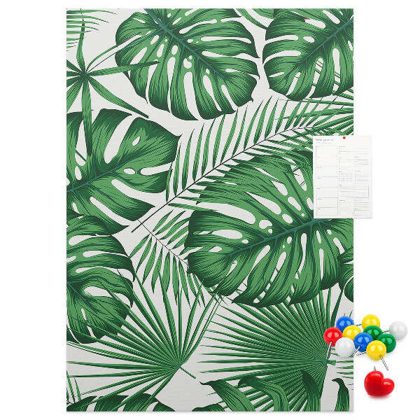 Wall cork memo board Monstera leaves on a light background