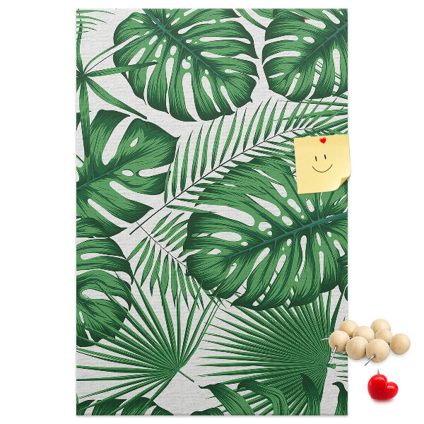 Wall cork memo board Monstera leaves on a light background