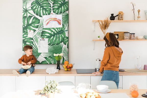 Wall cork memo board Monstera leaves on a light background