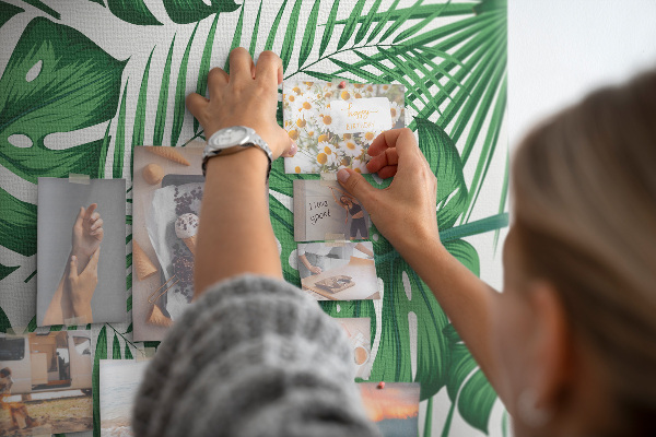 Wall cork memo board Monstera leaves on a light background