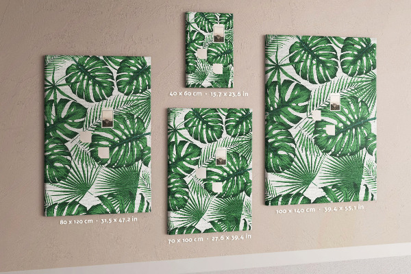 Wall cork memo board Monstera leaves on a light background