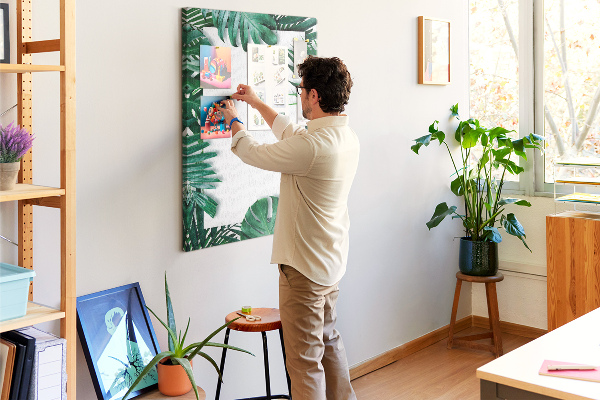 Pin board Tropical leaves surrounded by a white frame