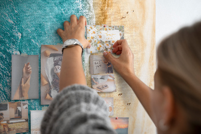 Memo cork board A beach with waves and people walking around