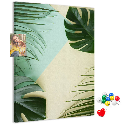 Memo cork board Palm leaves on a pastel background