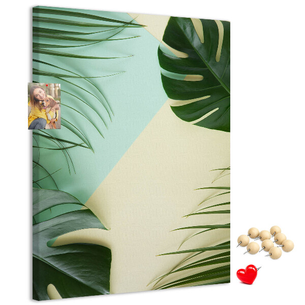 Memo cork board Palm leaves on a pastel background