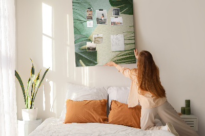 Memo cork board Palm leaves on a pastel background
