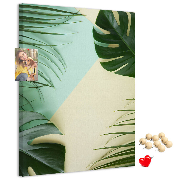 Memo cork board Palm leaves on a pastel background