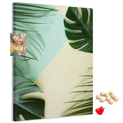 Memo cork board Palm leaves on a pastel background