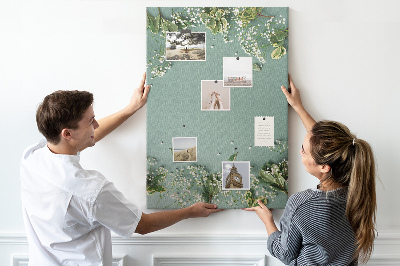 Cork notice board Green background with delicate flowers and leaves