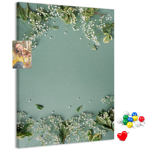 Cork notice board Green background with delicate flowers and leaves