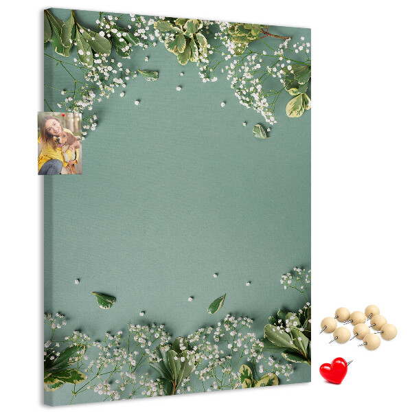 Cork notice board Green background with delicate flowers and leaves