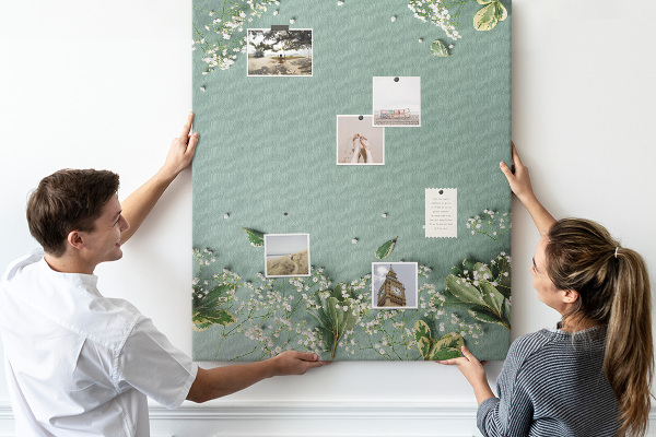 Cork notice board Green background with delicate flowers and leaves