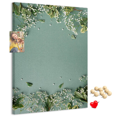 Cork notice board Green background with delicate flowers and leaves