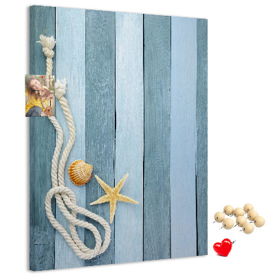 Pin board Seaside vibe with blue planks and a shell