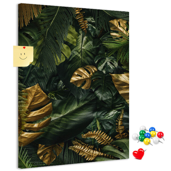 with golden leaves in a tropical plant composition