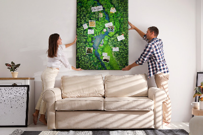 Cork notice board A green landscape with a winding river