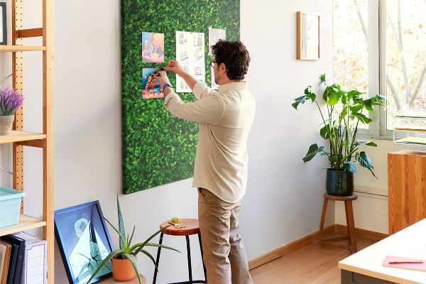 Cork notice board Green dense leafy wall