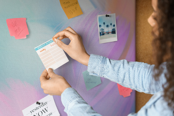 Cork notice board Delicate feathers in pastel colors