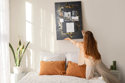 Pin board Gold and silver accents on a black background