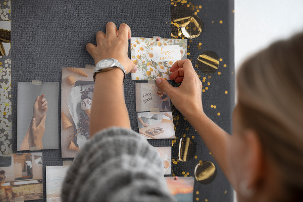 Pin board Gold and silver accents on a black background