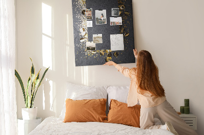 Pin board Gold and silver accents on a black background