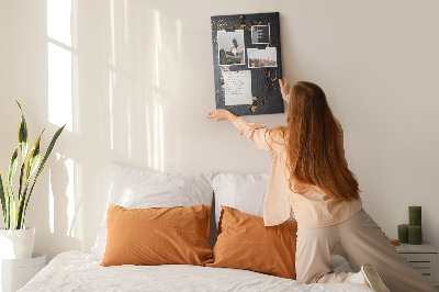 Pin board Gold and silver accents on a black background