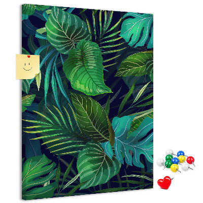 Cork notice board Tropical leaves on a dark background