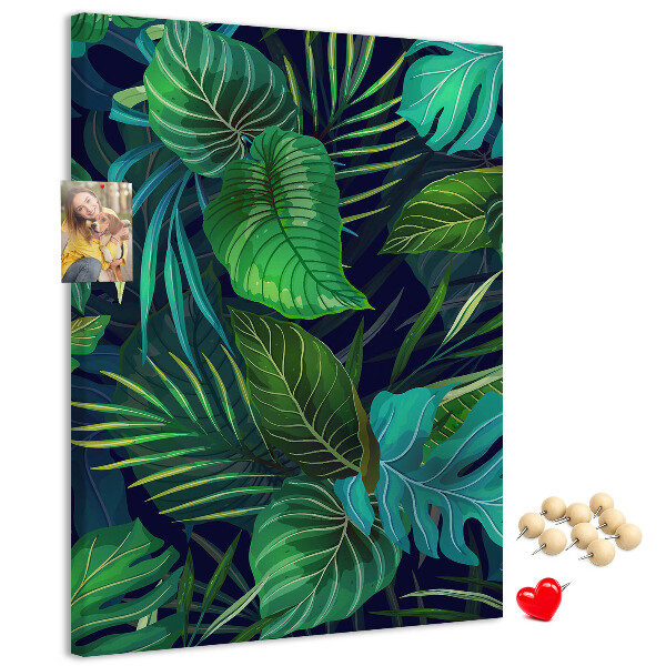 Cork notice board Tropical leaves on a dark background