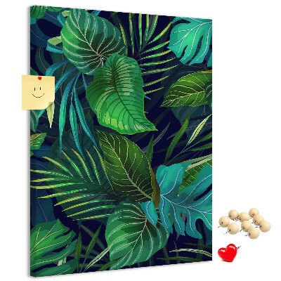 Cork notice board Tropical leaves on a dark background