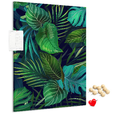 Cork notice board Tropical leaves on a dark background