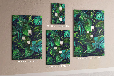 Cork notice board Tropical leaves on a dark background