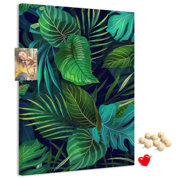 Cork notice board Tropical leaves on a dark background