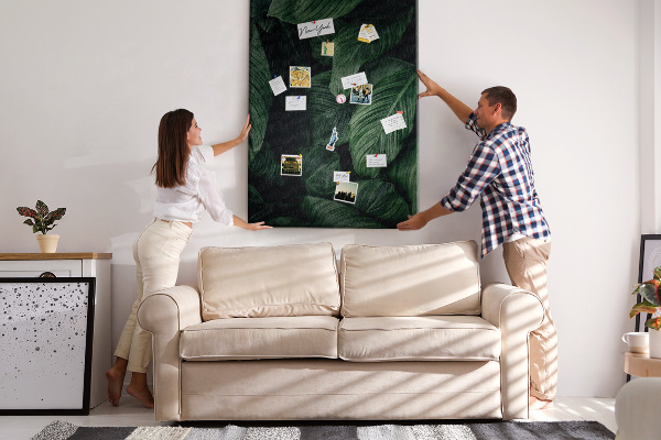 Memo cork board Green leaves in a dark background