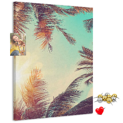 Pin board Tropical palm leaves in the setting sun