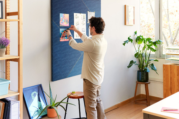 Cork notice board in a modern blue design