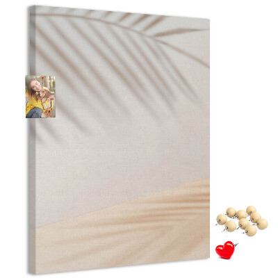 Cork notice board Delicate shadows of palm trees on a light background